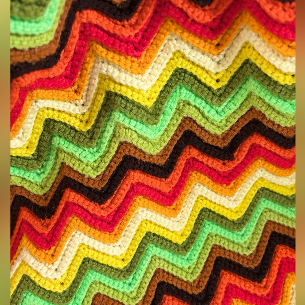 70s hand-crocheted afghan blanket with a colorful chevron (zig-zag) pattern. - Picture 3 of 8